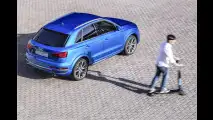 Q3 mit Longboard für die Stadt