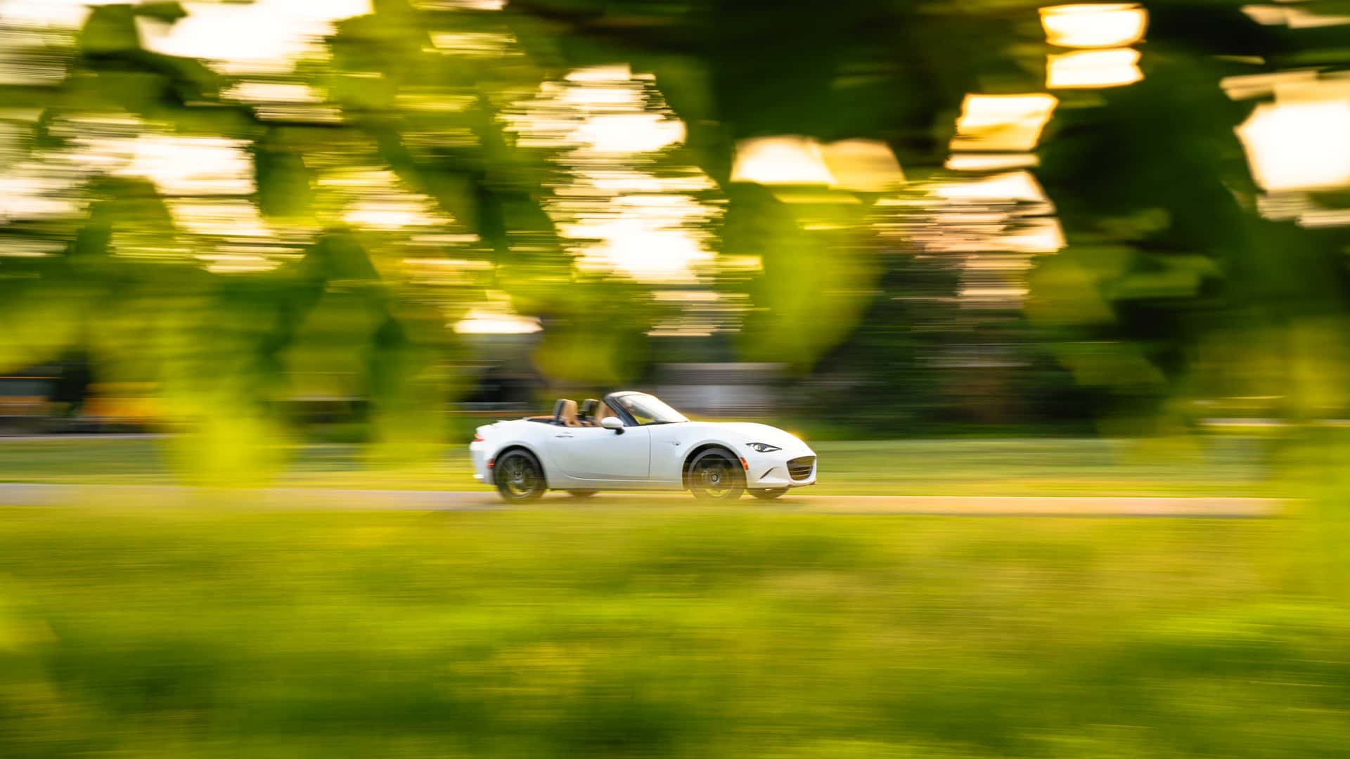 https://cdn.motor1.com/images/mgl/VzeqzR/s1/2024-mazda-mx-5-miata-grand-touring-review.jpg