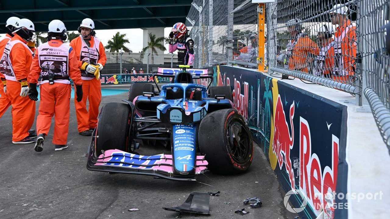 Marshals assist Esteban Ocon at Miami GP 2022