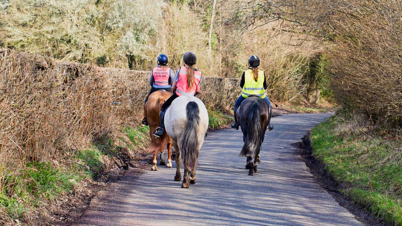 Horse riders on a UK country lane