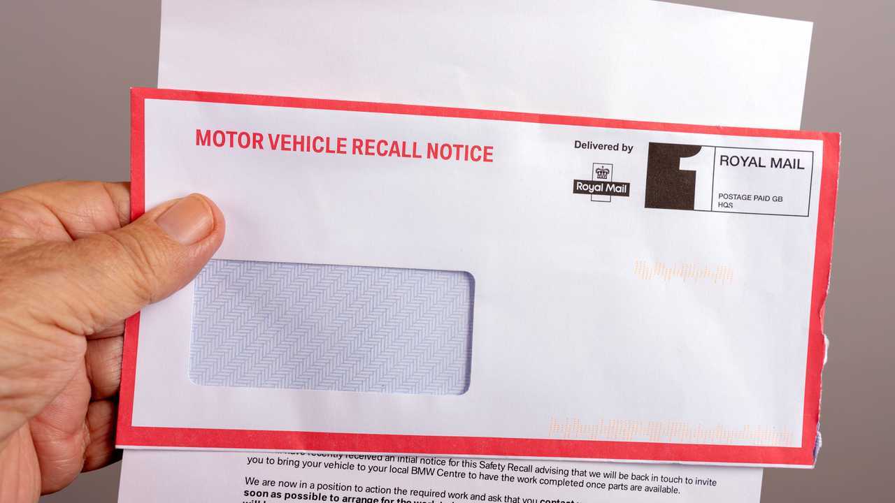 Official notification letter and envelope for a UK car safety recall