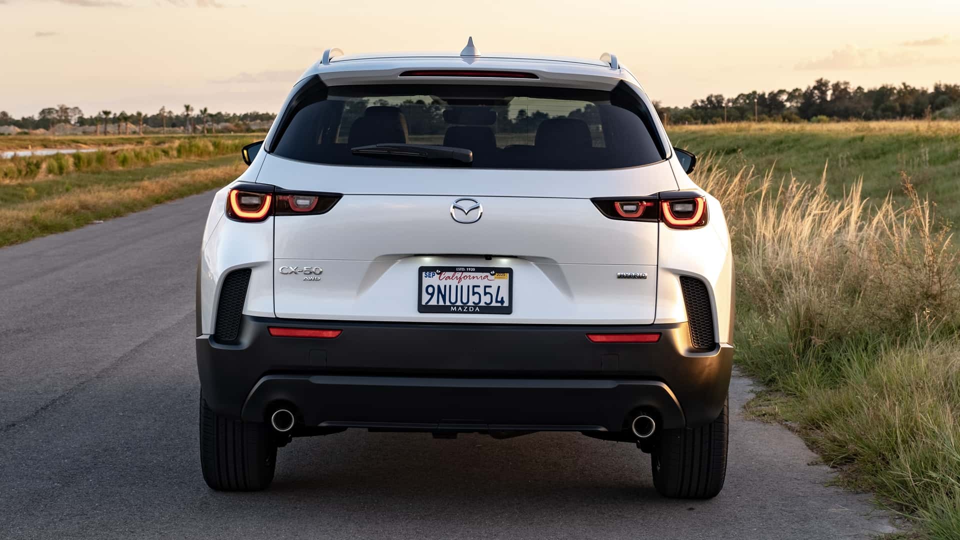 https://cdn.motor1.com/images/mgl/W8Yep6/s1/2025-mazda-cx-50-hybrid-first-drive-review.jpg
