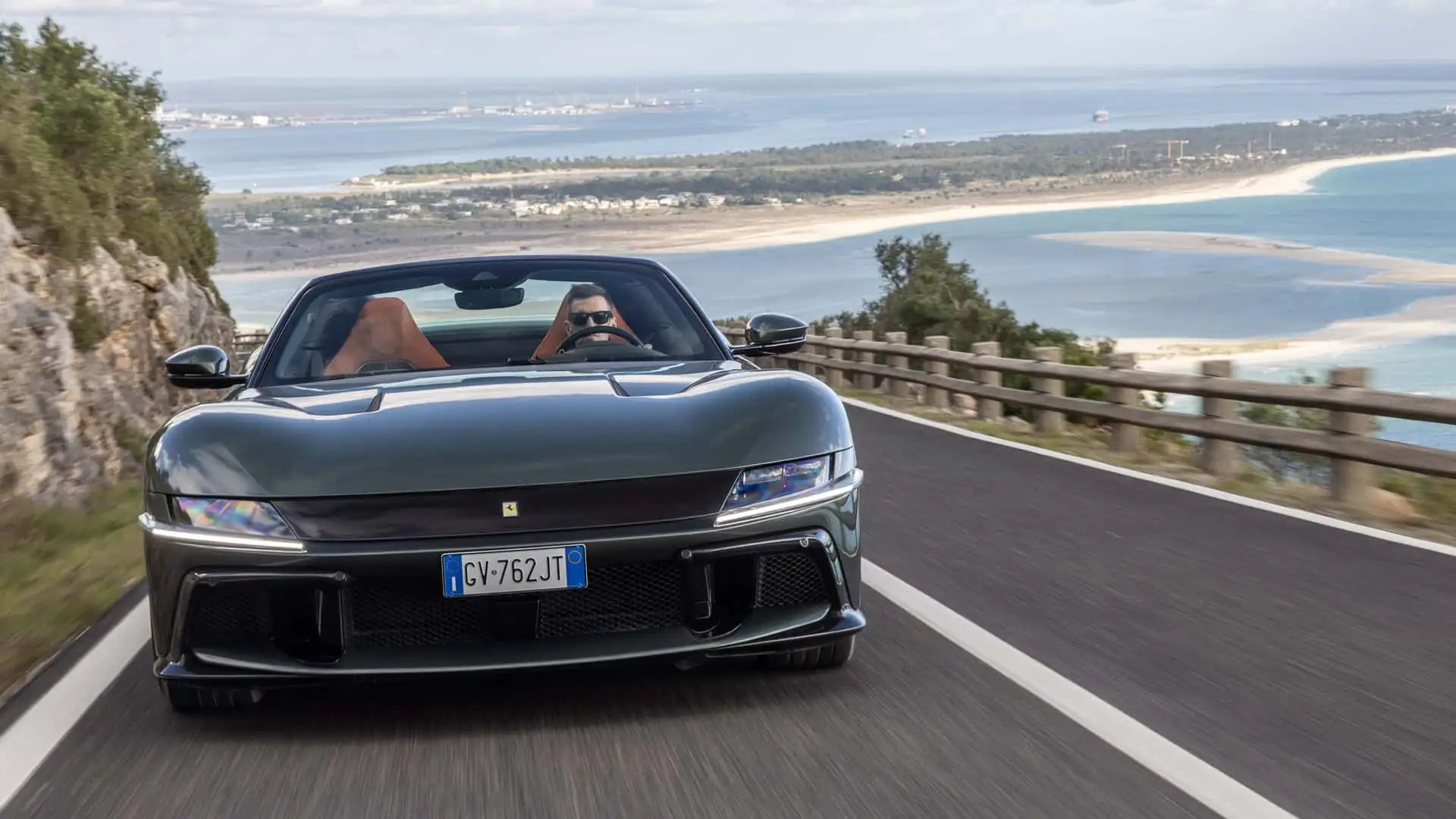 https://cdn.motor1.com/images/mgl/W8q11O/s1/2025-ferrari-12cilindri-spider-first-drive-review.webp