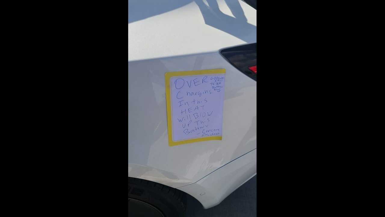 Note left by unidentified person who unplugged Tesla Model 3