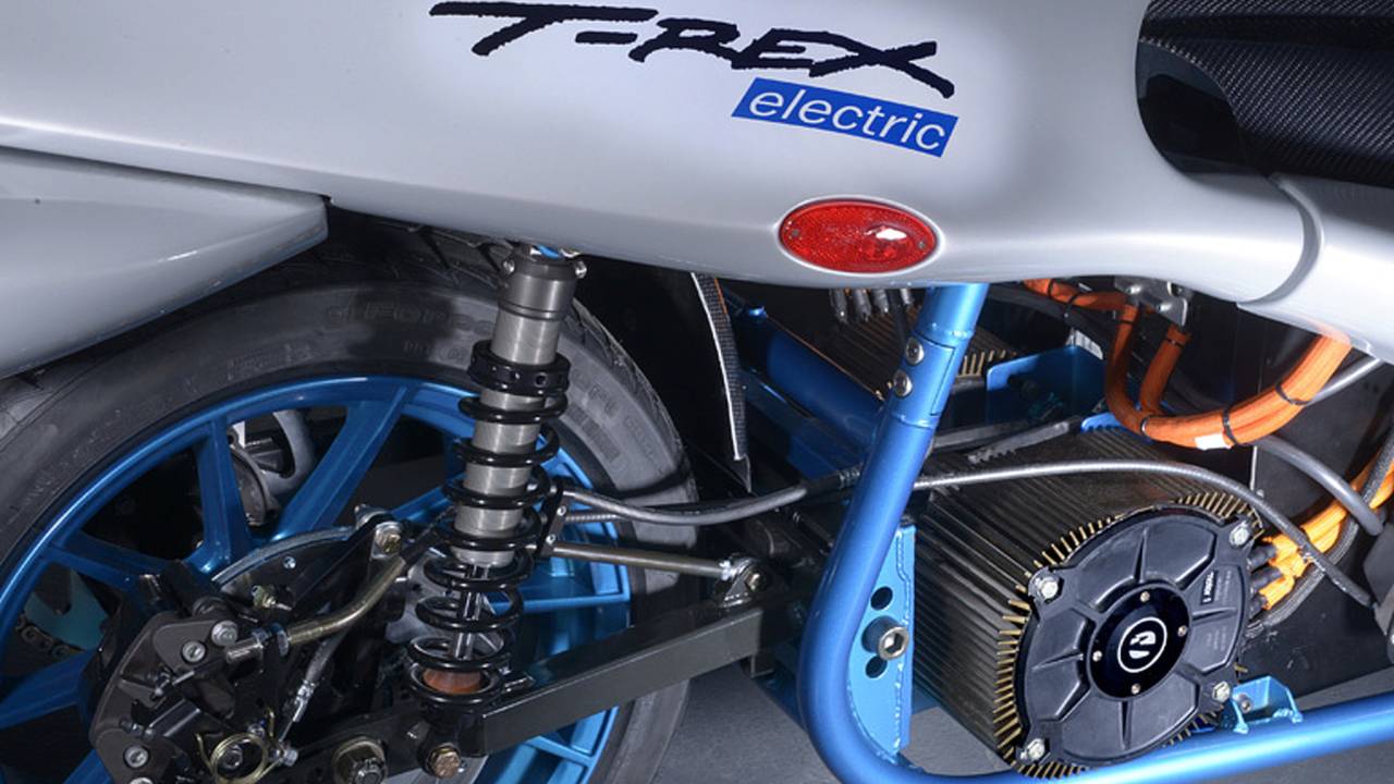 A close-up of the rear swingarm, suspension, and powerplant.