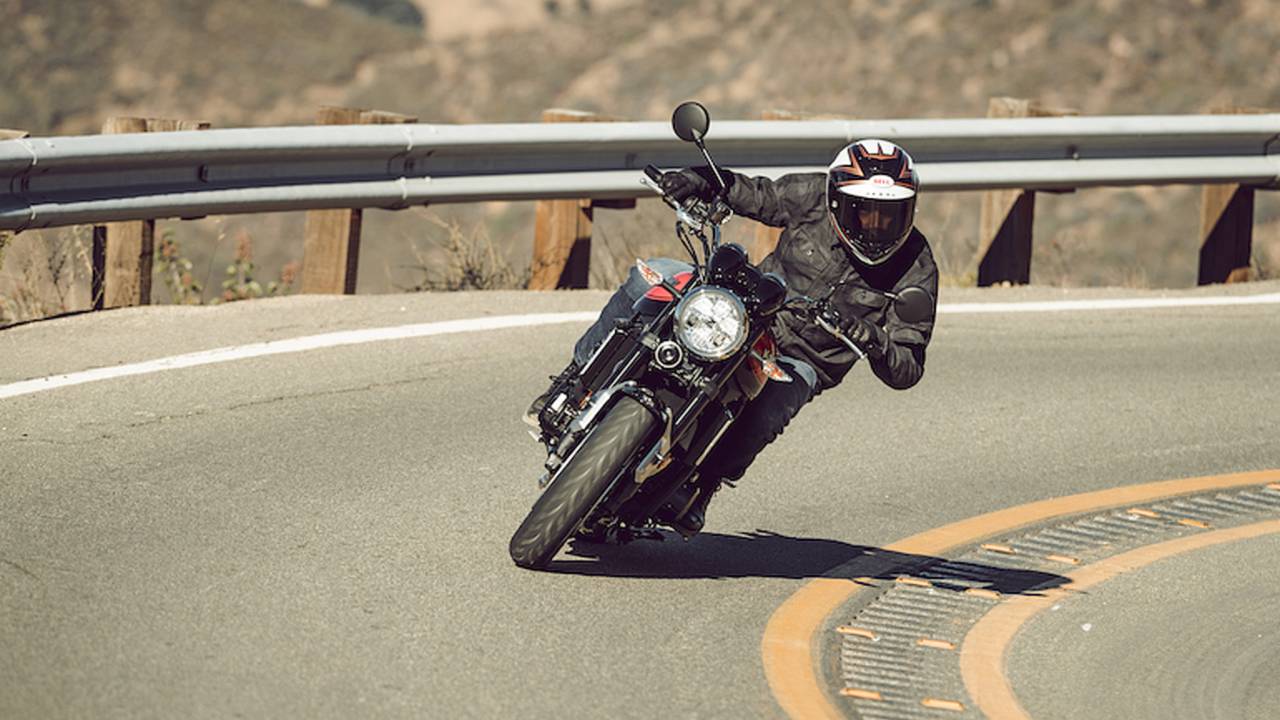 <em>Adjustable suspension boosts the Z900RS’s handling capabilities on curvy roads.</em>