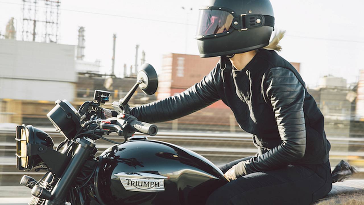<em>Jaime riding her 2014 Triumph Bonneville.</em>