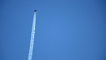 Jaguar XJR races man on jet pack
