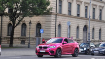 BMW X6 M with pink chrome wrap