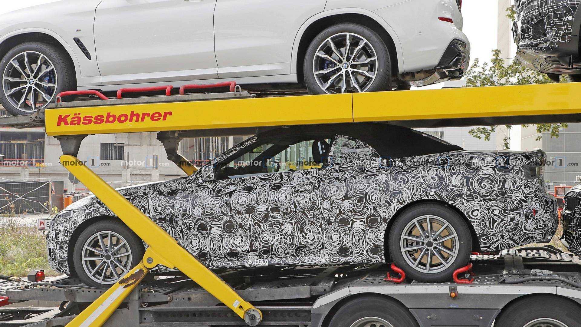https://cdn.motor1.com/images/mgl/WwbVN/s1/new-bmw-4-series-convertible-spy-photo.jpg new-bmw-4-series-convertible-spy-photo