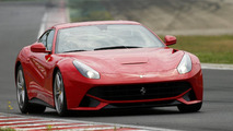 Sebastian Vettel with the Ferrari F12berlinetta