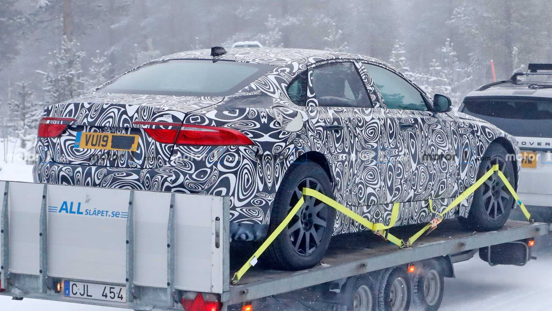 https://cdn.motor1.com/images/mgl/X8zJe/s1/jaguar-xj-ev-spy-shots.jpg jaguar-xj-ev-spy-shots