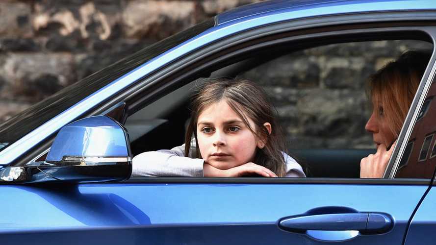 Kid bored in traffic