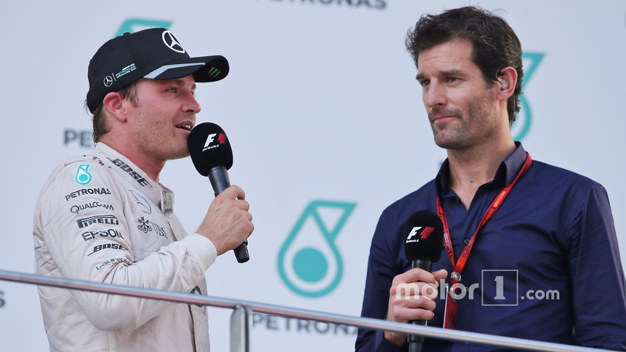 Nico Rosberg, Mercedes AMG F1 on the podium with Mark Webber, Porsche Team WEC Driver / Channel 4 Presenter