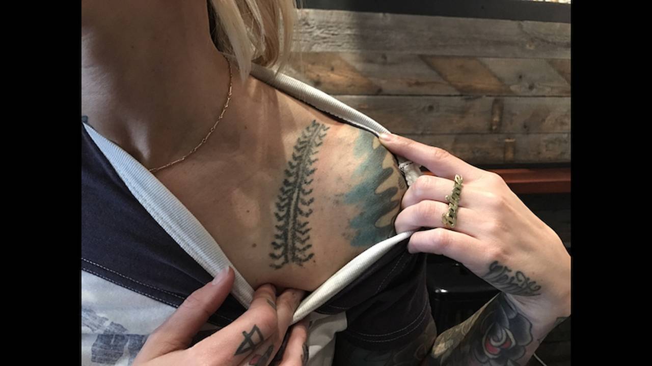 <em>Jaime’s traditional centipede tattoo done by 96-year-old Fang-Od</em>