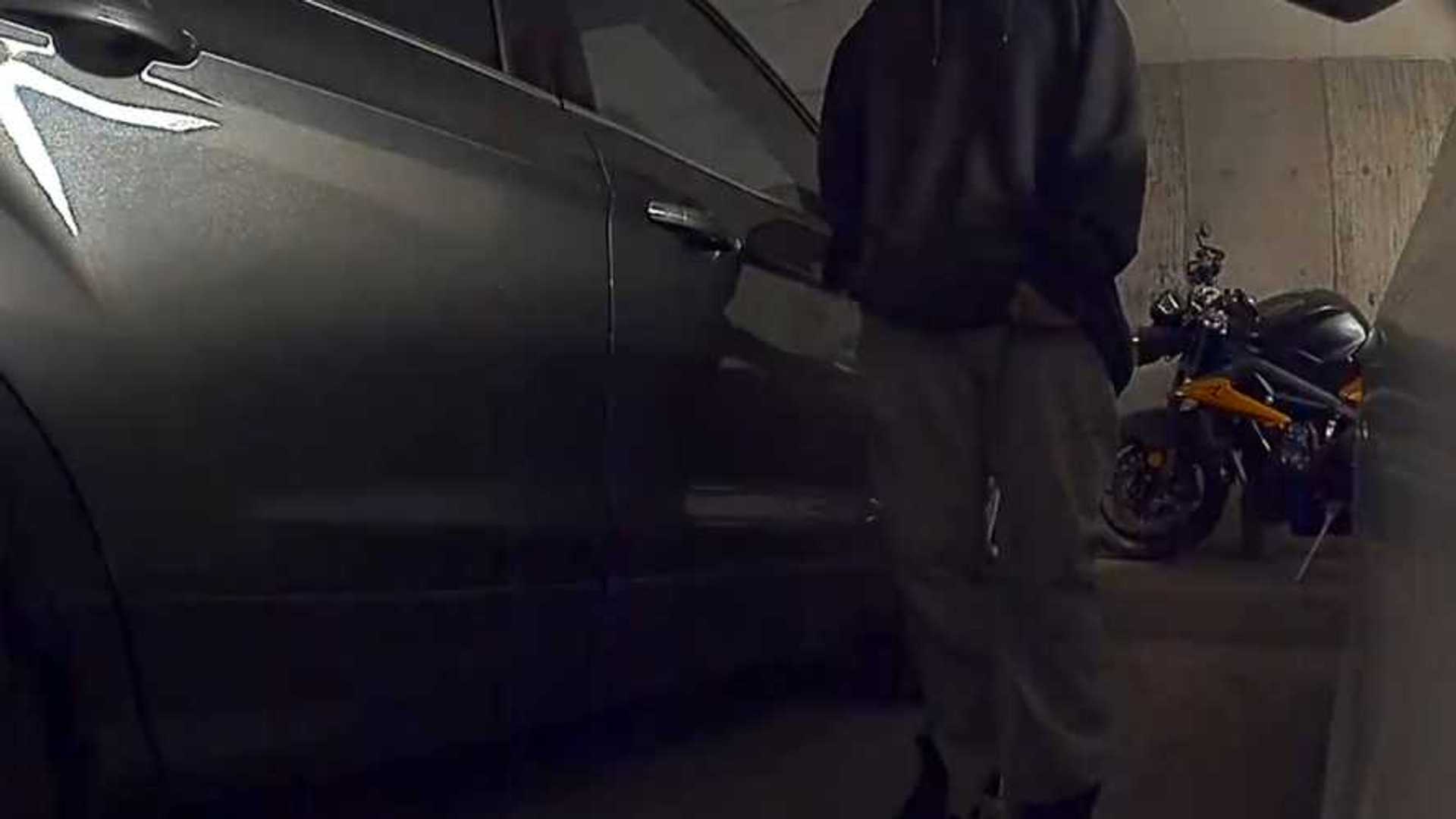 Watch tesla sentry mode scare off potential thief