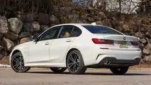 2021 BMW 330e rear quarter wide