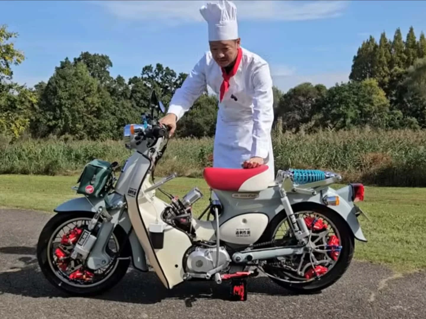 This Custom Honda Cub Has Adjustable Ride Height, and All the