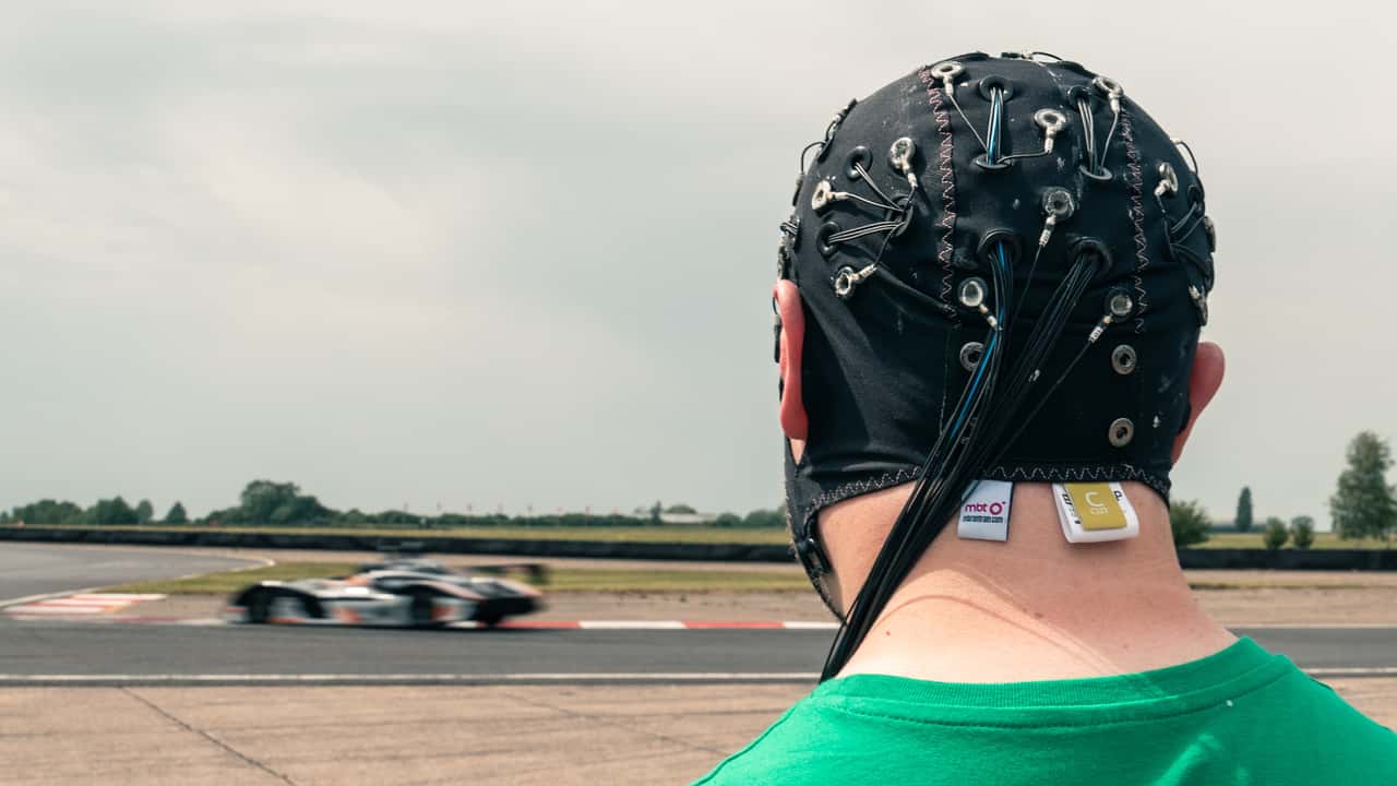 Castrol Thrill of Driving - Cap wearer by track