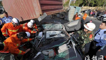 Audi S5 flattened by container