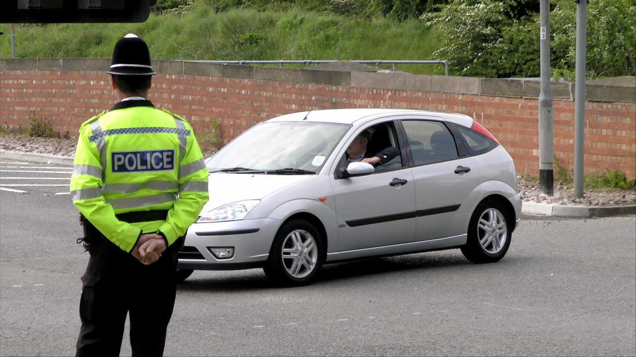 British policeman watches traffic in York UK