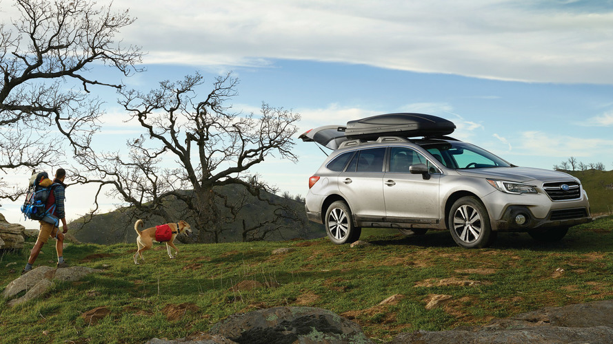 2018 Subaru Outback with family and dog