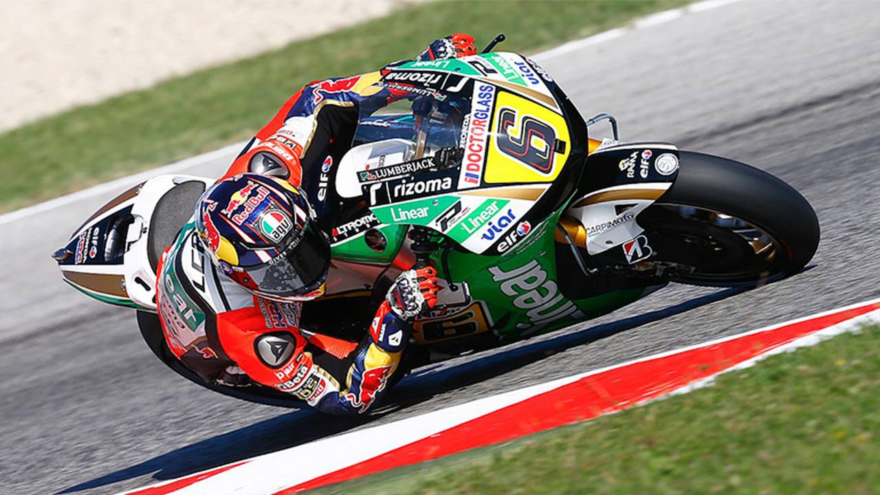 Ideally you want your upper body to be off the side and draped over the bike.