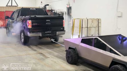 Watch Tiny, Tri-Motor Tesla Cybertruck Out Tug A Ford F-150 Pickup