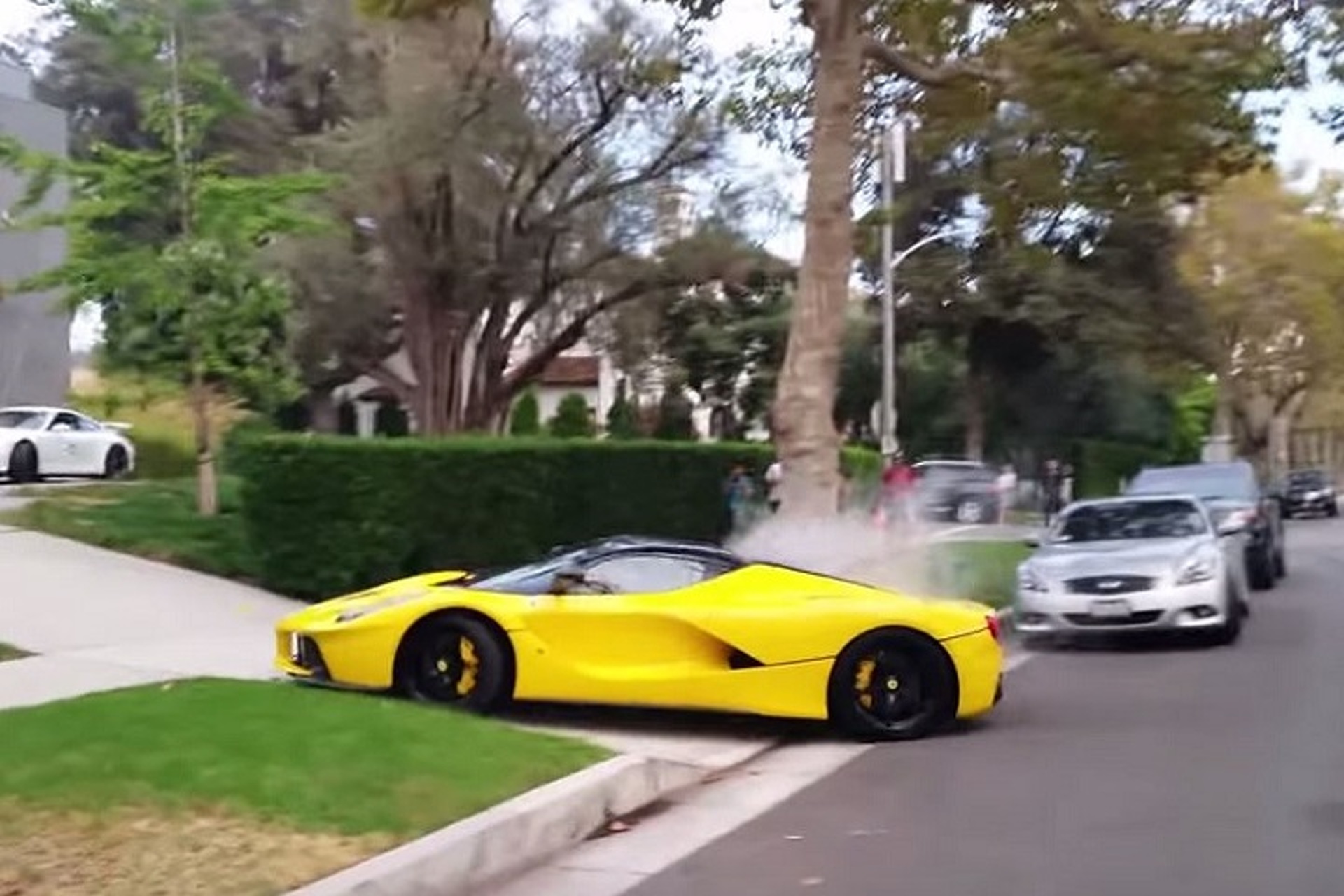 Watch As A LaFerrari and Porsche 911 GT3 Are Trashed By Morons