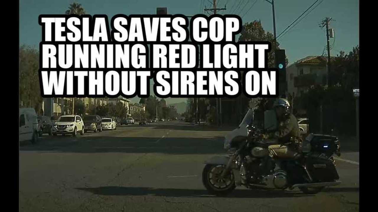 tesla saves cop