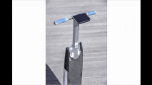 Q3 mit Longboard für die Stadt