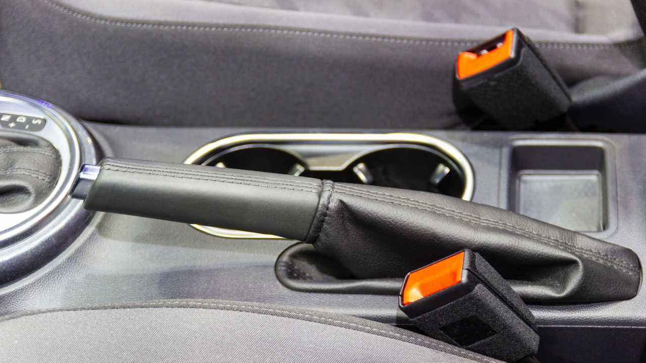 Car hand parking brake closeup