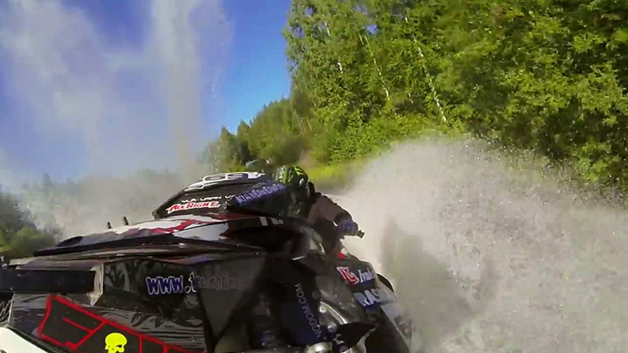 Watch This SnowMobile Ride Across Water With Fire Balls in Tow