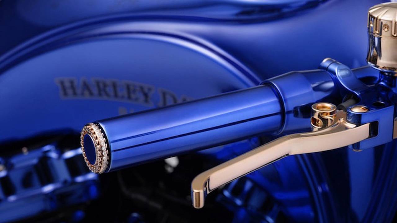 The hand levers are gold-plated and the bar ends are diamond studded