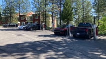 2025 Chevrolet Blazer EV at a Tesla Supercharger