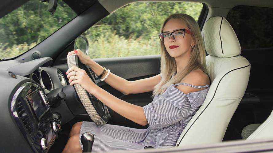 Young woman driving a car