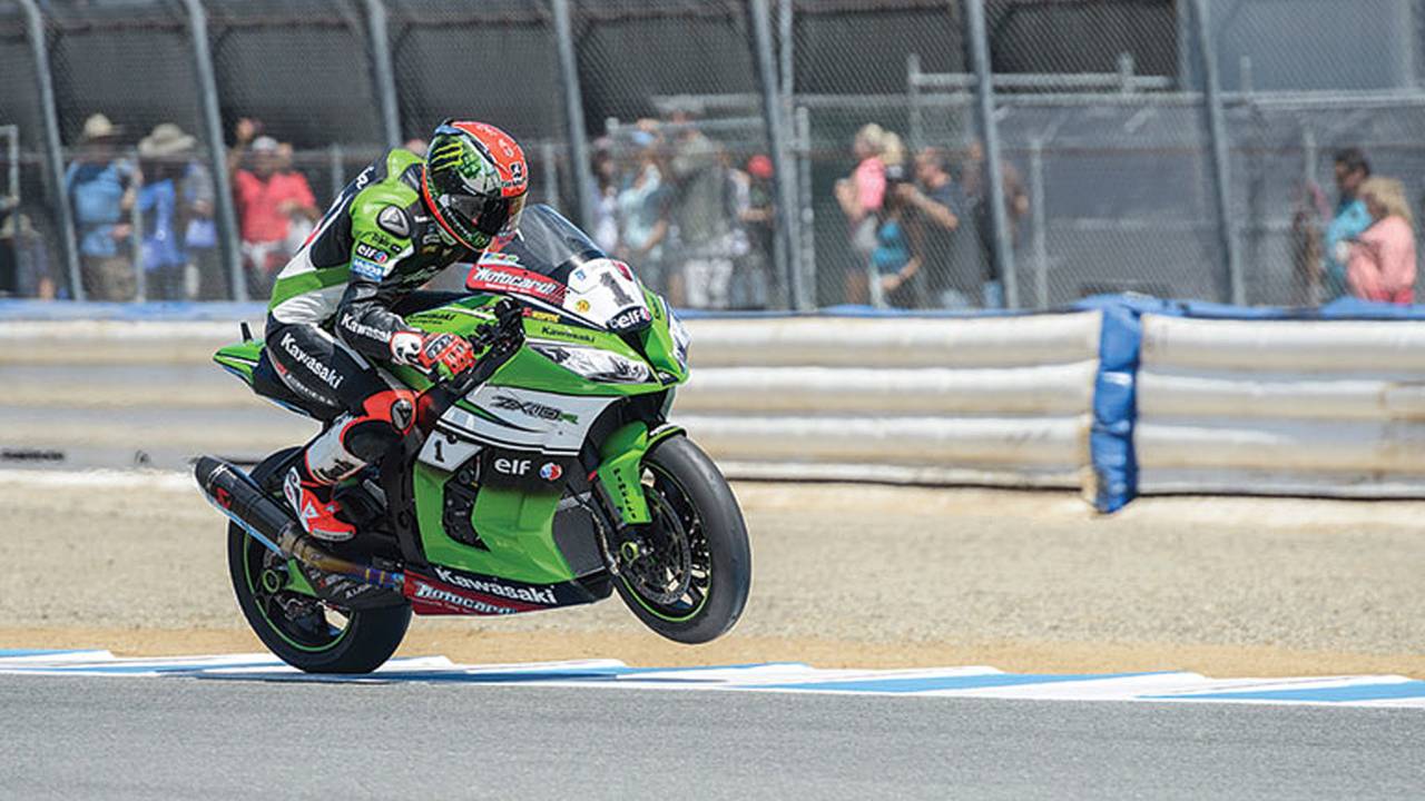 Tom Sykes wheelying out of Turn 3