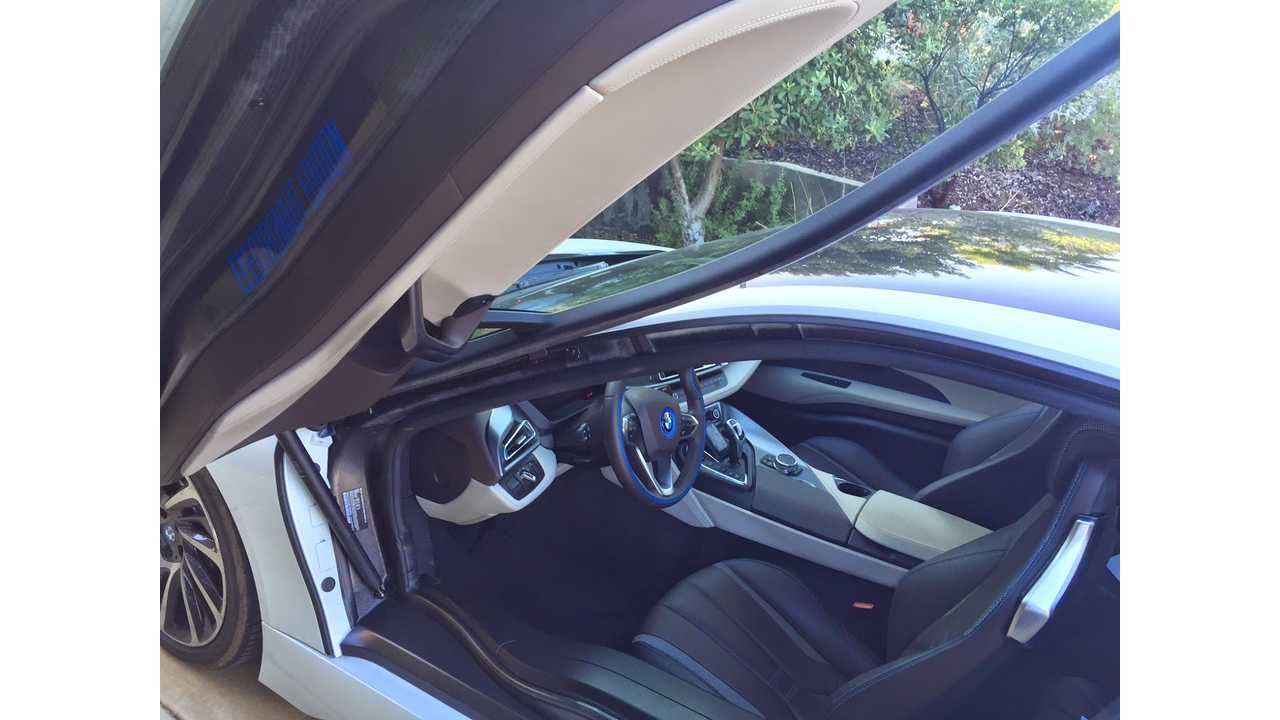The EE is on the door sill of the i3 and the bottom of the door on the i8