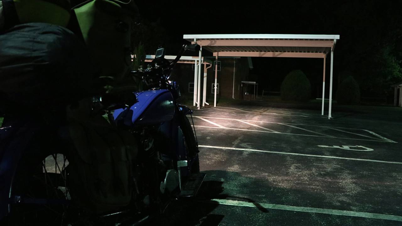 My 6 volt headlight is nothing compared to today's modern headlights, but it is a hell of a lot better than a flashlight! Photo by Panhead Jim.