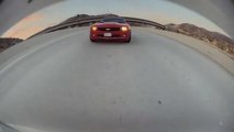 See This Camaro Driver Throw A Bunch Of Coins In a Tesla Model 3