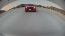 See This Camaro Driver Throw A Bunch Of Coins In a Tesla Model 3