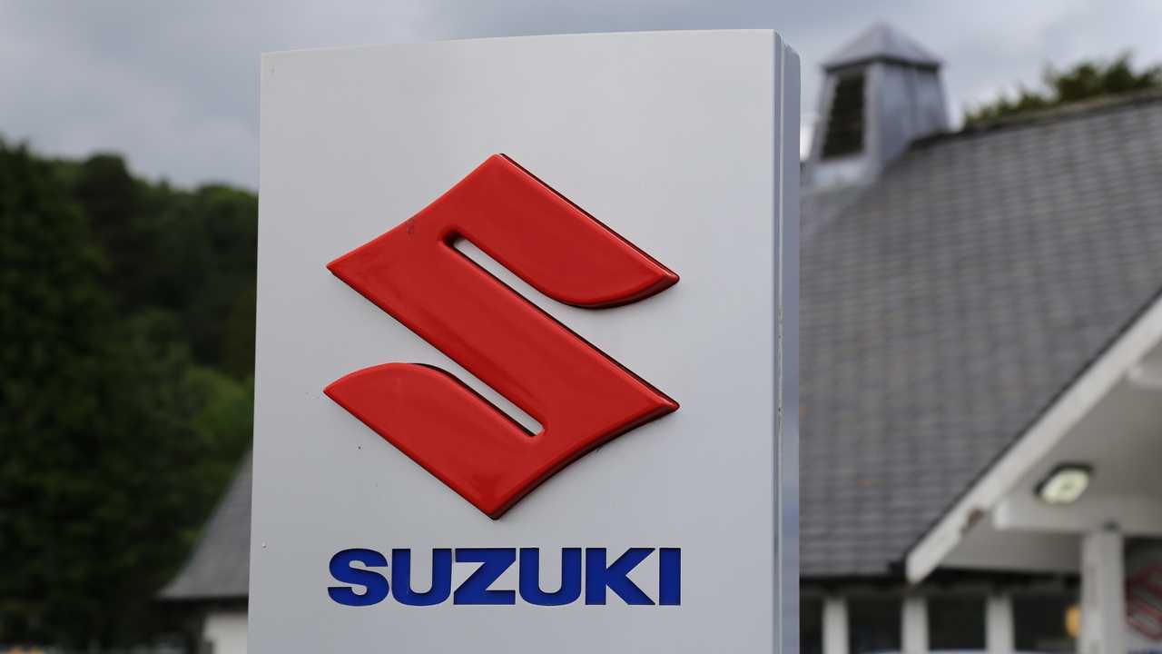 Suzuki company logo outside dealer in Dolgellau Gwynedd Wales UK