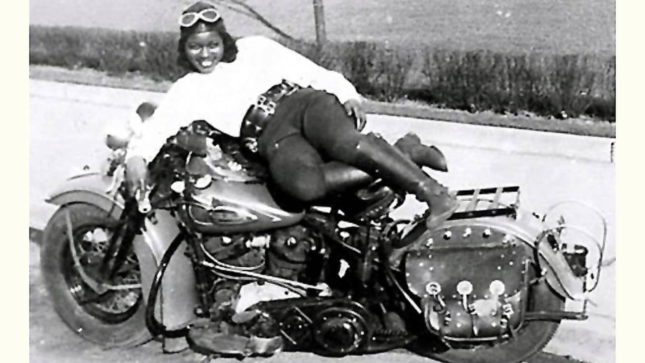 Bessie looking extremely comfy on her Harley