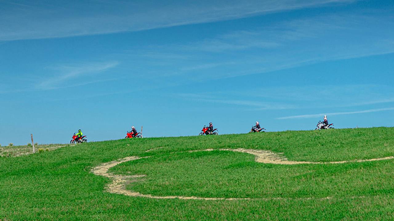 Riding the rolling Tuscan hills.