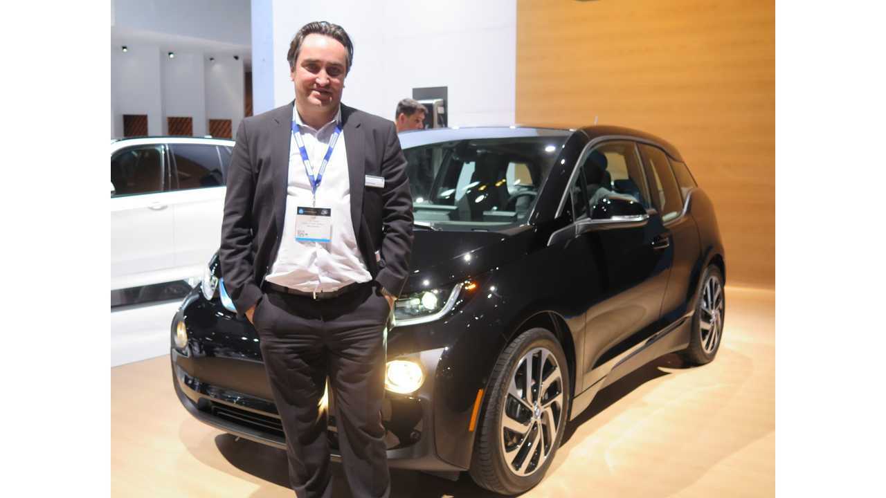 Cliff Fietzek, Manager of Connected eMobility for BMW of North America, stands in front of the special edition Shadow Sport i3 on display at the LA Auto Show