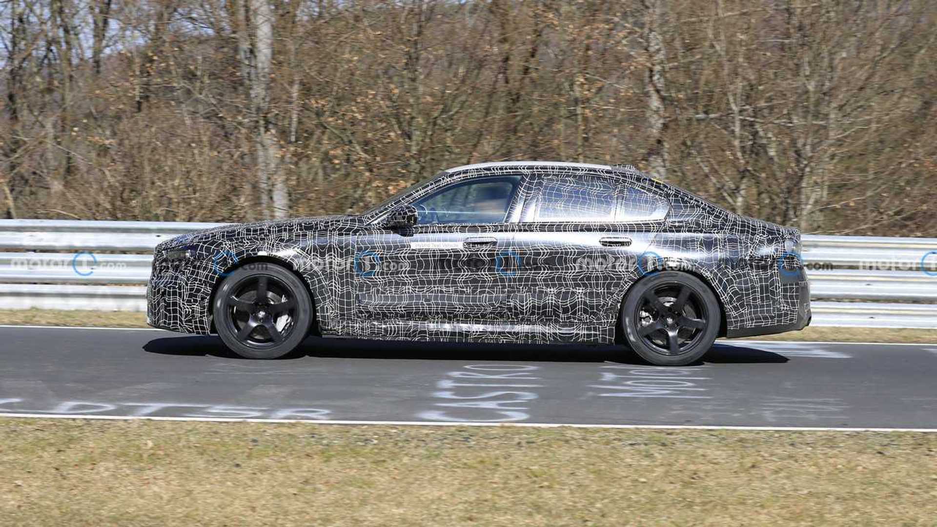 2024-bmw-m5-hybrid-side-view-spy-photo.jpg