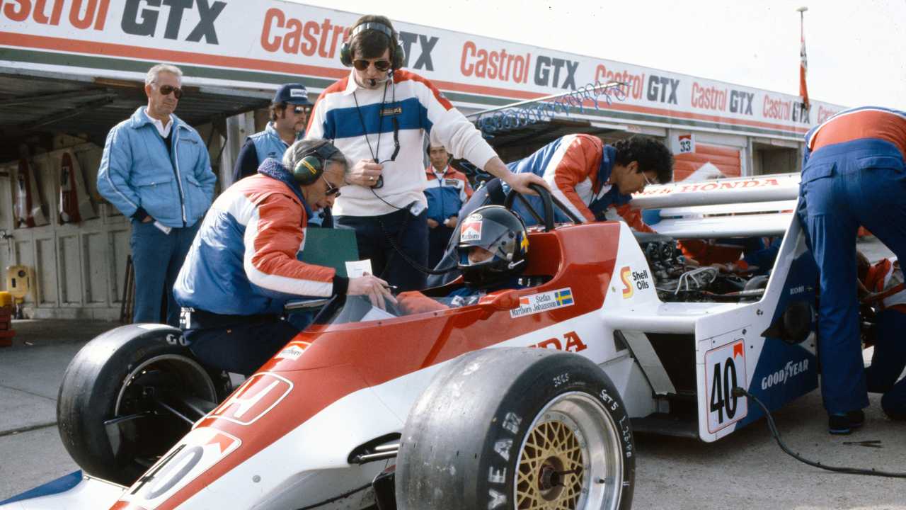 Stefan Johansson, Spirit 201C Honda, in the pit lane. Team manager John Wickham and designer Gordon Coppuck are in attendance.