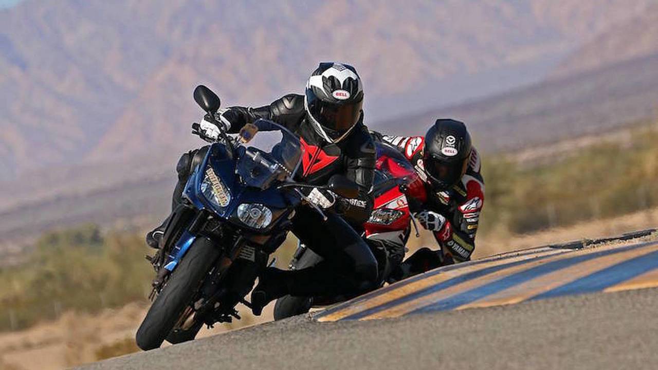 Ken Hill with MotoAmerica racer Josh Herrin.