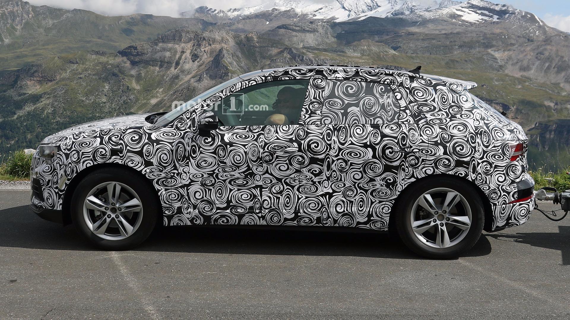2019 audi q3 test driver smiles for the spy camera