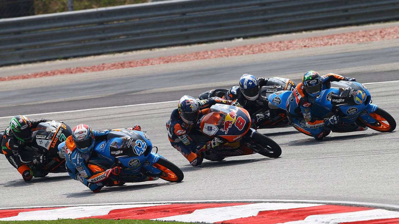 Jack Miller (8) finds his KTM swarmed by the Hondas of the Estrella Galicia and Saxoprint RTG squads. It was a common sight for Miller in 2014, and notable by the absence of a teammate to help him. (Photo courtesy Red Bull KTM Ajo.)